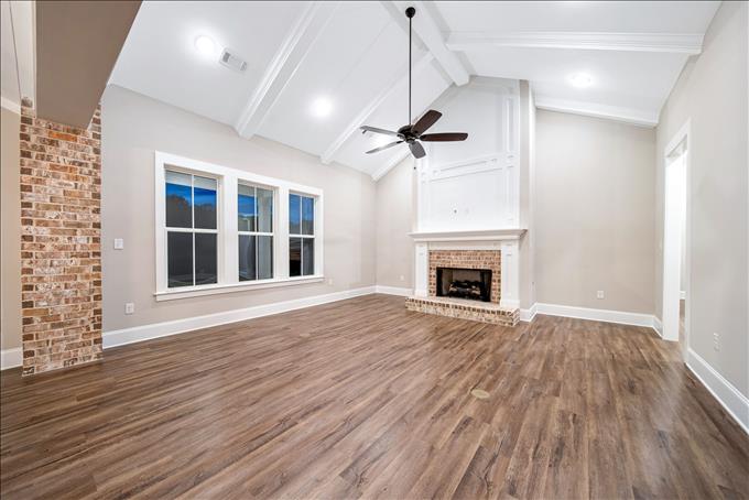 Vaulted Great Room with Brick Columns