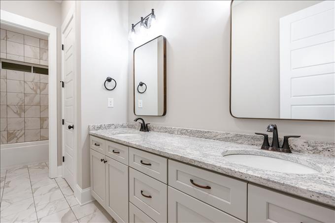 Dual Vanity Hallway Bathroom